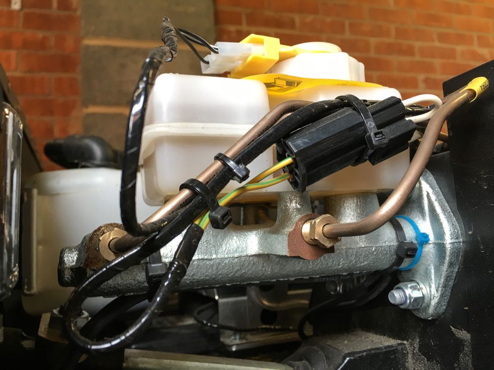 A brake master cylinder on a Caterham Seven